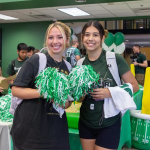 Students showing off their prizes at last year's College Colors Day event,