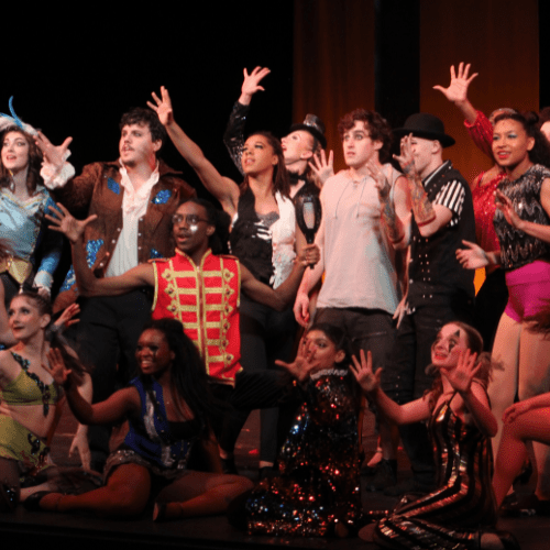students with jazz hands