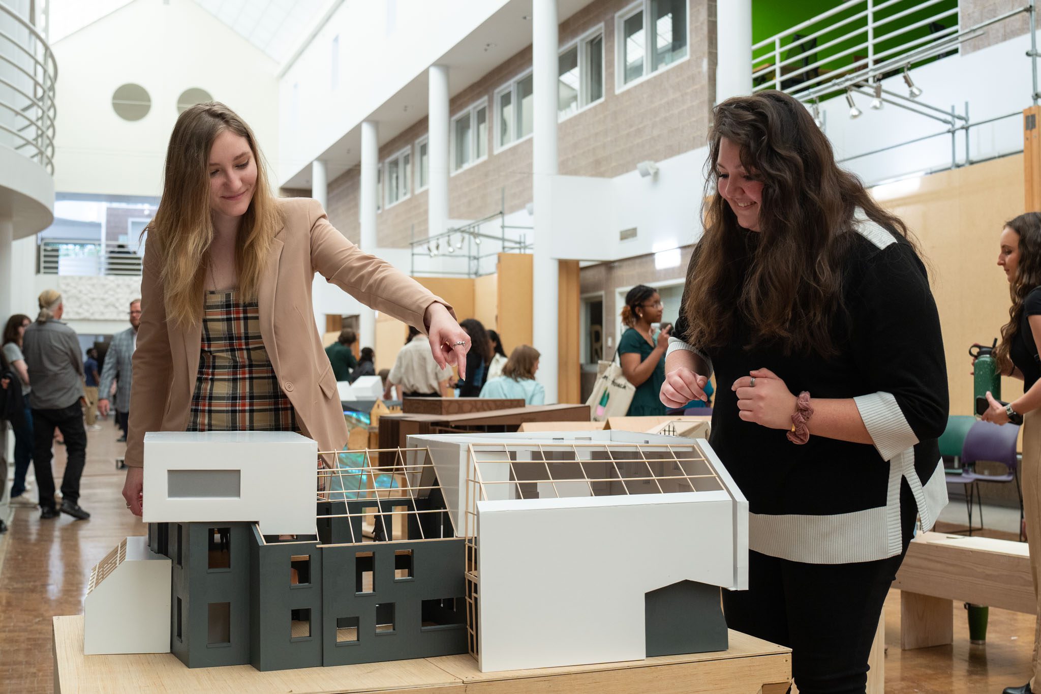 students with their models