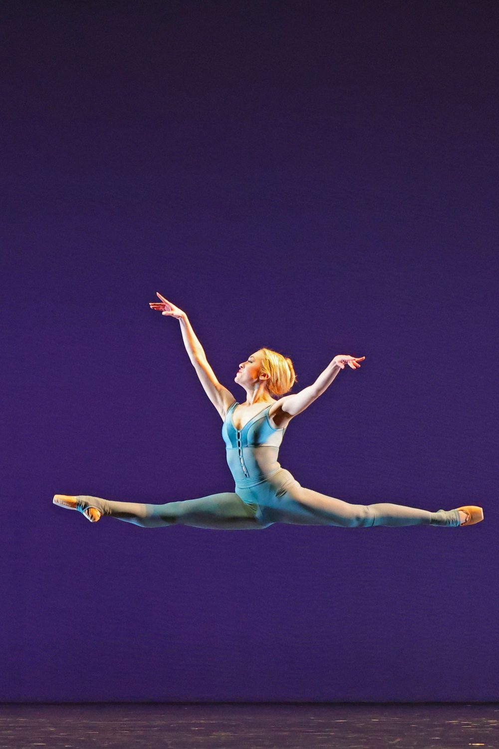 ballet dancers in a jump
